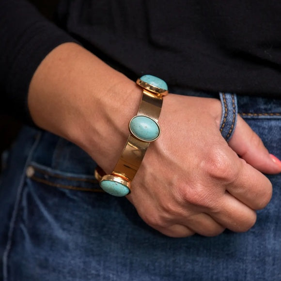 Model wearing Gold Bangle Turquoise Stones Bracelet