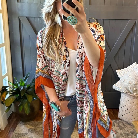 The RedWater Cardigan by Lavender Tribe Design. 
Our Darling Bohemian Lightweight Kimono Cardigan features the sweetest boho print and fringed hem.
+ Lightweight Cotton Gauze