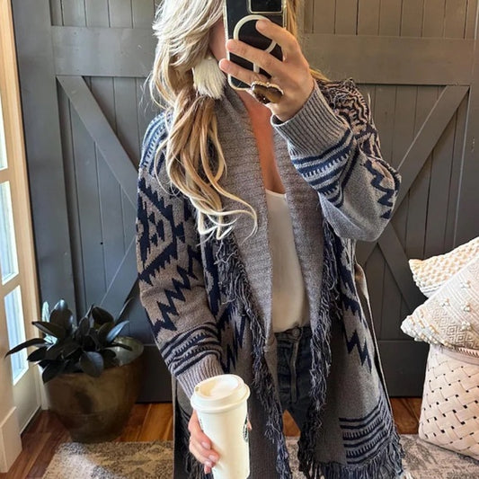 Blond Model The Atwood Cardigan Sweater Handmade by Lavender Tribe Design.
Featuring a Cozy Native Southwest Geometric Aztec Print, Belted Waist, and Substantial Knitted Fabric.
