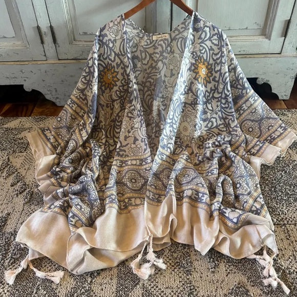 The Dolan Cardigan by Lavender Tribe Design Design.
Our Darling Bohemian Lightweight Kimono Cardigan featured the sweetest boho print and tasseled detailed hem.